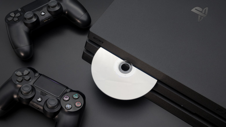 A disc entering a PS4 console
