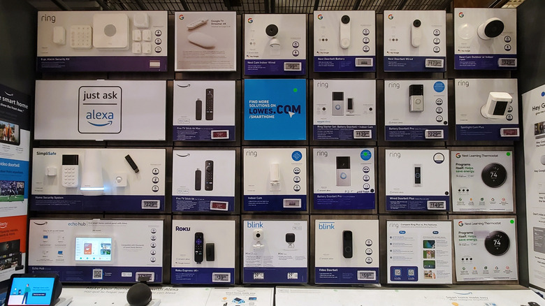 A full shop display of smart home cameras and sensors