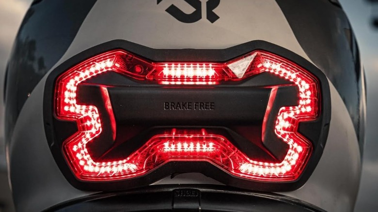A Brake Free light mounted on the back of a helmet.