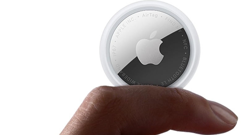 AirTag Gen 2 being held up in a person's hand