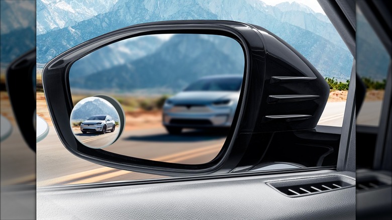 Blind spot mirror installed on a car's rearview mirror
