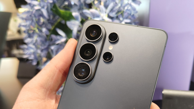 The rear camera bump of a black Samsung Galaxy S26 Ultra.