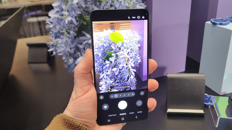 The camera app on a Samsung Galaxy S26 Ultra, photographing some flowers