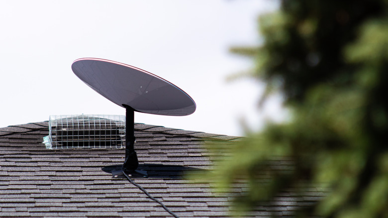 A Starlink dish installed on the roof of a house.