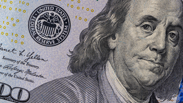 A close-up of a $100 bill.