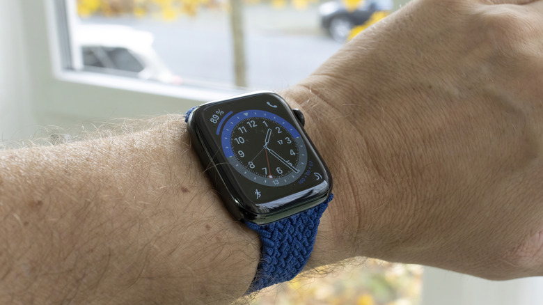 Apple Watch showing watch face with complications and shortcuts.