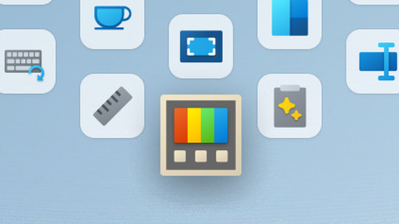 The Microsoft PowerToys icon surrounded by various feature icons