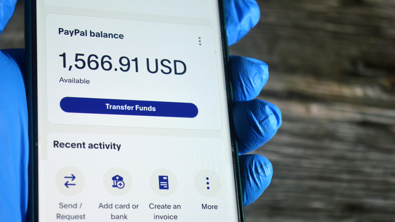 A PayPal app showing the account balance and icons for other functions.