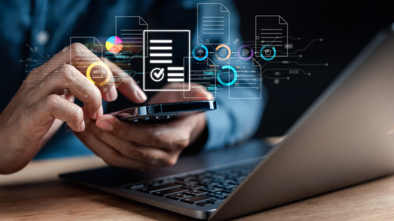 A person evaluating information on phone