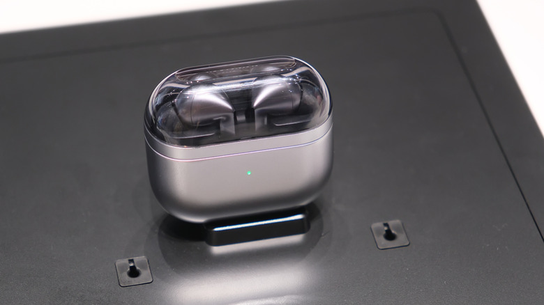 The Samsung Galaxy Buds 3 Pro in their case.