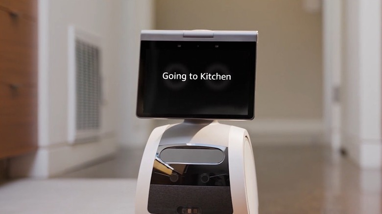 Astro Robot reading "Going to Kitchen" on its screen.