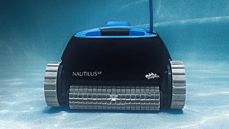 Dolphin Nautilus robotic pool vacuum cleaner inside a swimming pool.