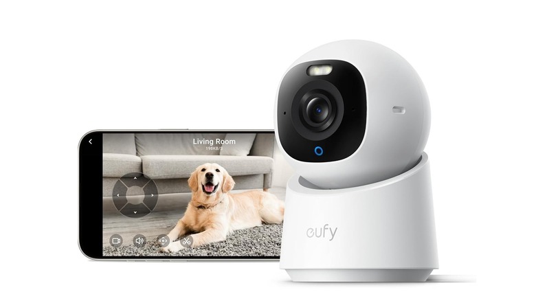 The Eufy Indoor Cam E30 security camera with its companion app showing a livestream against a white background.
