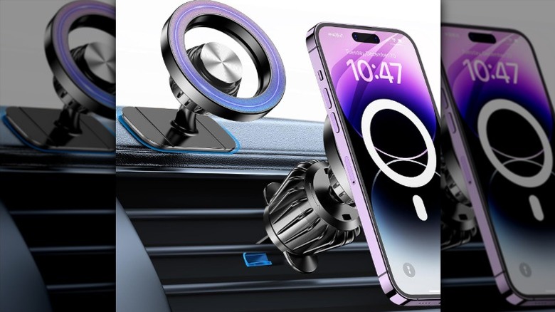 Smartphone mounted on a magnetic car mount attached to AC vents.