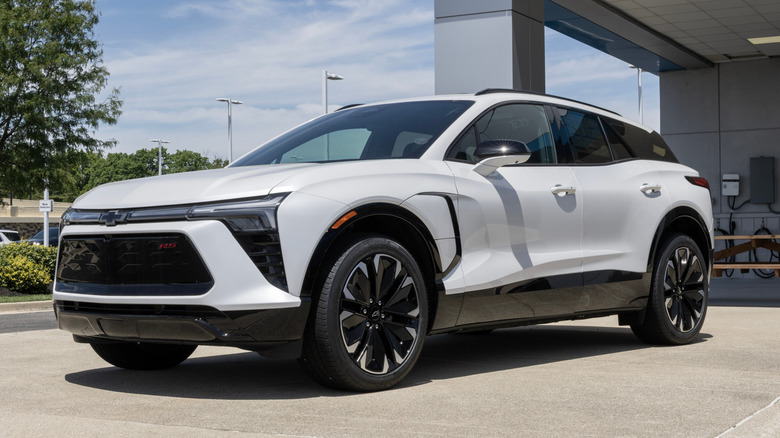 A 2025 Chevrolet Blazer EV displayed outside the car showroom.