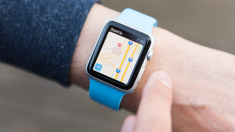 Slide of someone looking at the maps function on their Apple Watch
