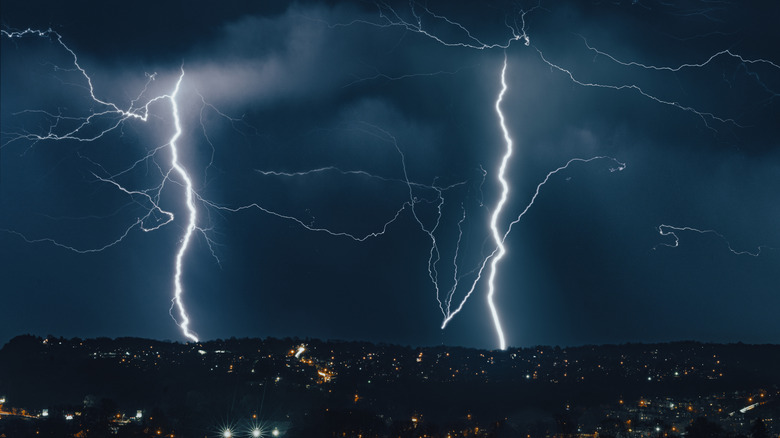 Lightning storm over a city landscape