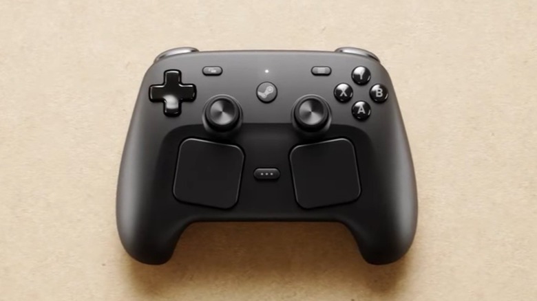 The Steam Controller (2nd Gen) on a light brown background.