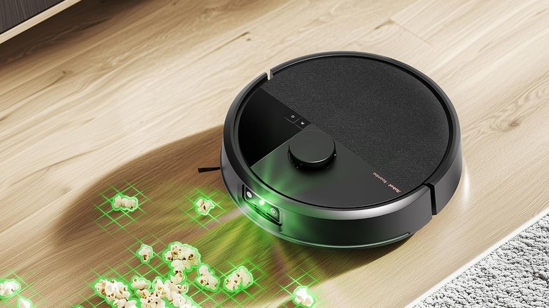 The iRobot Roomba Max 705 robot vacuum using dirt-detect technology to clean a floor.