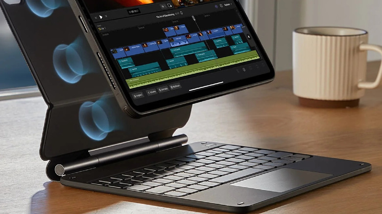 An iPad connecting to the ESR Rebound Magnetic Keyboard Case 360 on a wooden table