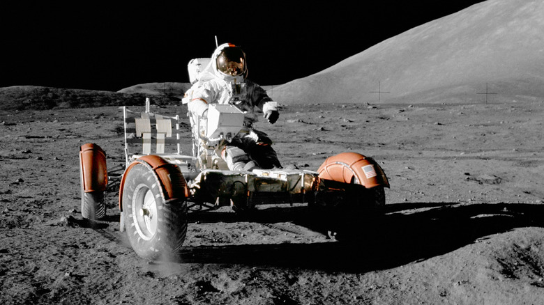Apollo 17 astronaut Eugene A. Cernan riding a Lunar Roving Vehicle on the moon