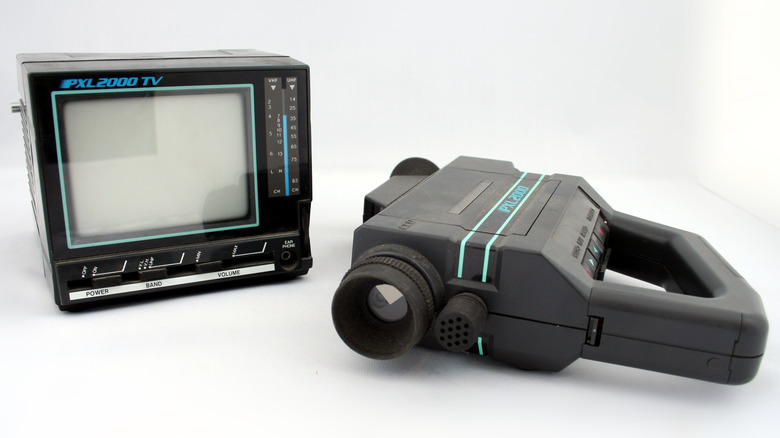 A PXL-2000 toy camcorder and portable television used for recording and playback.