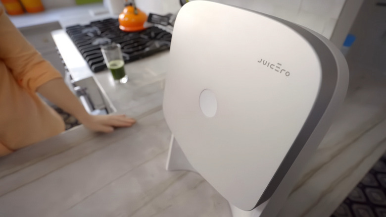 The Juicero internet-connected juice press sitting on a kitchen countertop.