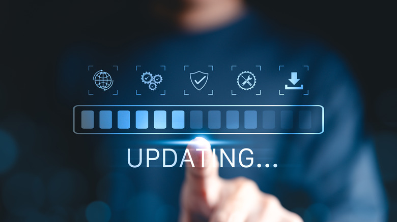 A loading icon with the word "updating" below it