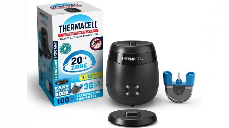 Thermacell mosquito repellant kit against a white background, including charger, box, and emitter