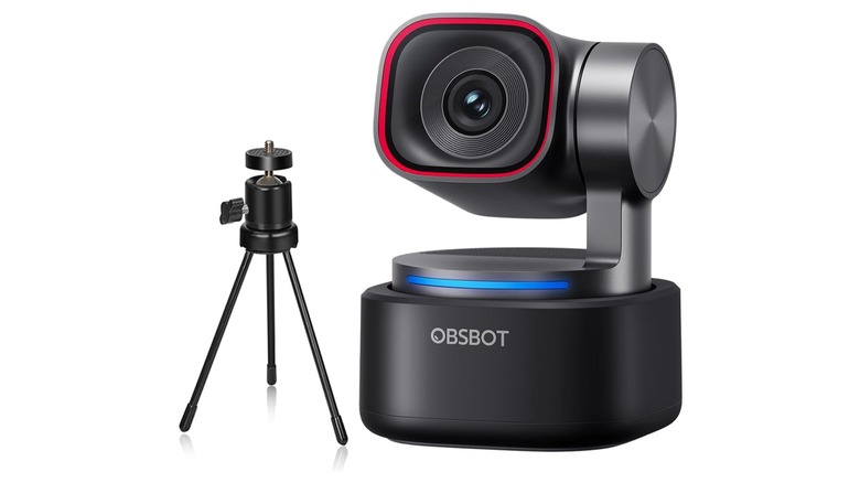 An OBSBOT 3 webcam next to a small tripod against a white background.