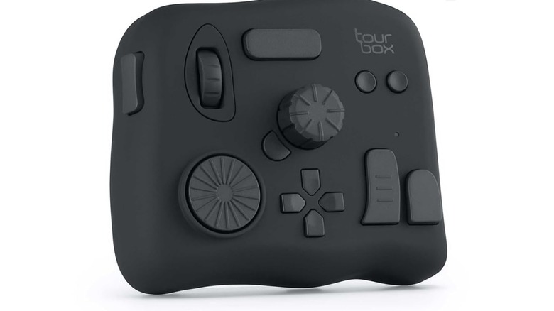 A TourBox NEO controller on a white background.