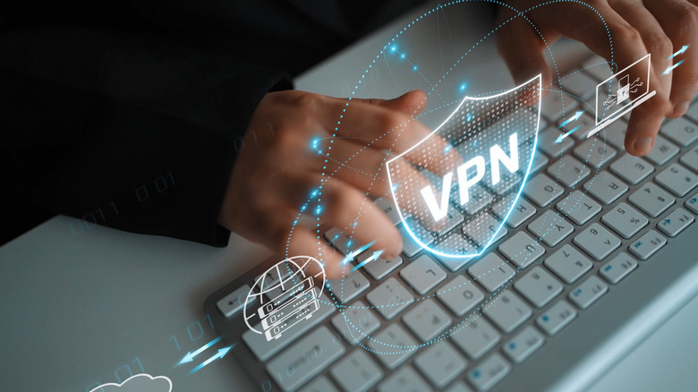 User typing on keyboard while protected by a VPN