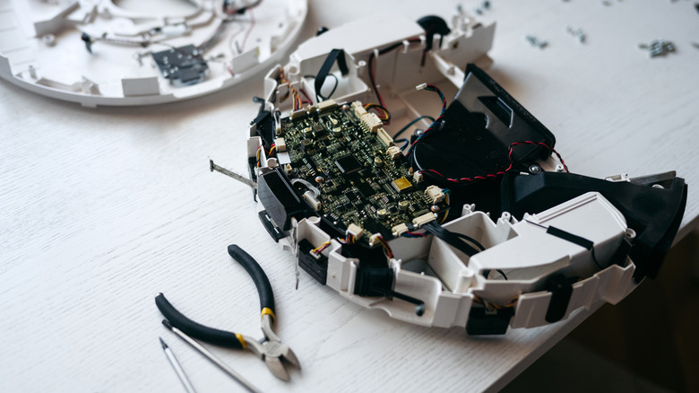 Disassembled robot vacuum cleaner
