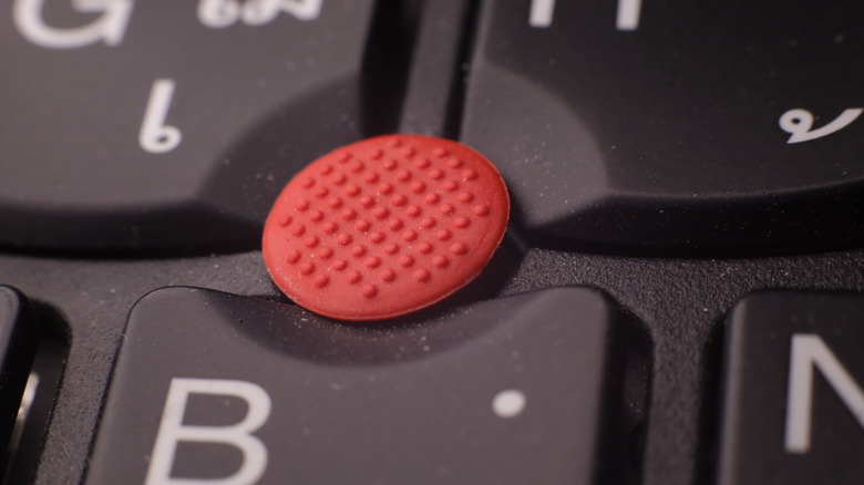 A close-up of the ThinkPad TrackPoint.