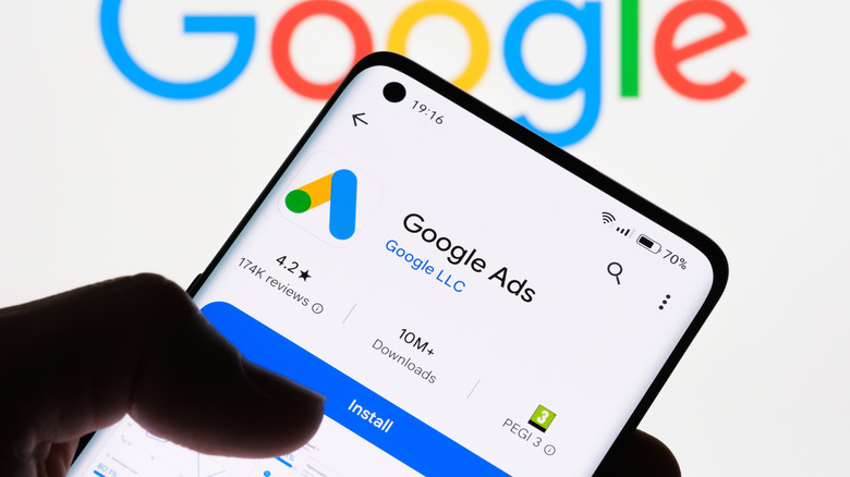 Android phone showing Google Ads app download page on Play Store