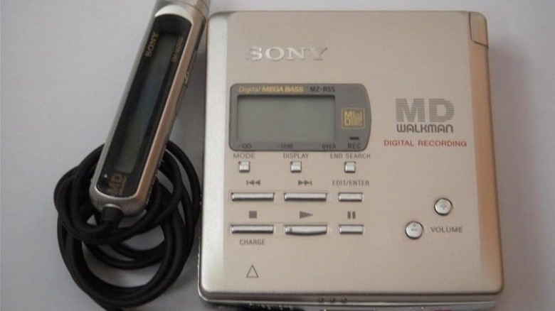 A Sony MZ-R55 MiniDisc player next to its remote.