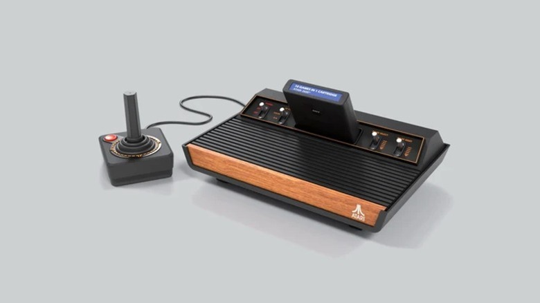 The Atari 2600+ console against a gray background.