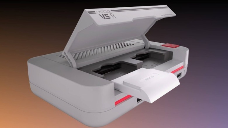 The Evercade VS-R console against an orange-to-dark-gray background.