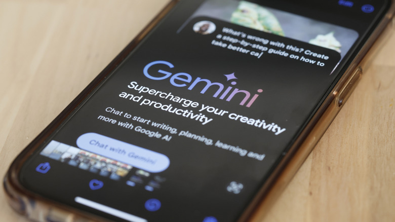 A close up of a smartphone showing the Google Gemini AI prompt and response.