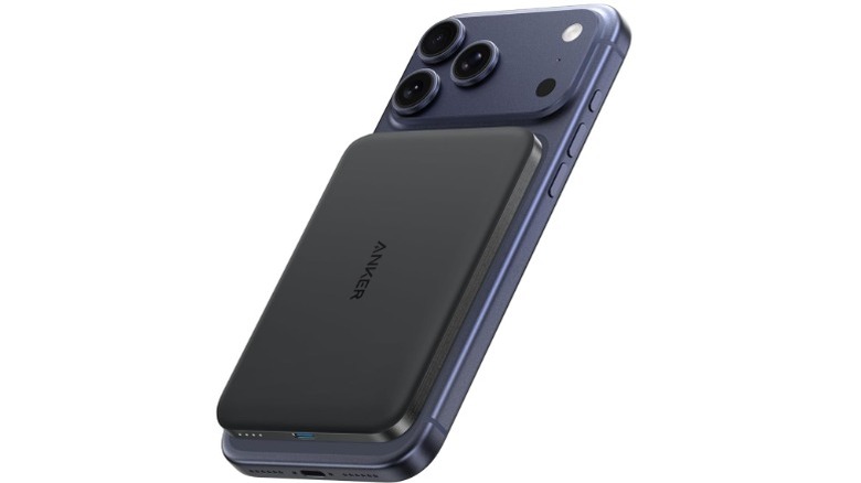 The Anker Nano MagSafe power bank attached to an iPhone 17 Pro.