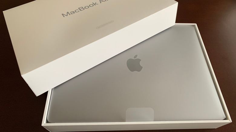 A MacBook Air in its original box.