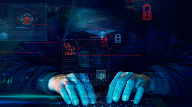 Nondescript hacker in front of a keyboard with red lock and decryption symbols.