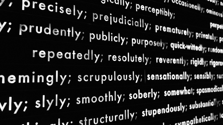 Random words and phrases on a black background.