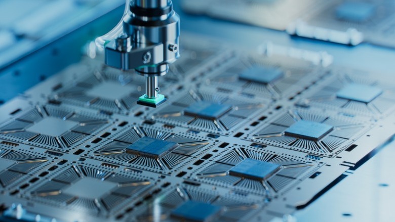 Closeup of a pick and place machine used in the computer chip manufacturing process