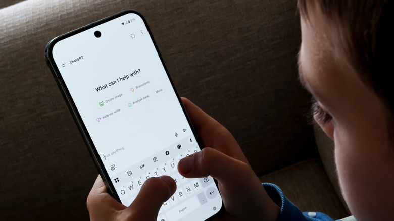 person using chatgpt on a smartphone, chatgpt screen asking "what can I help with?"