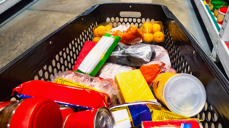 A full grocery cart in a store