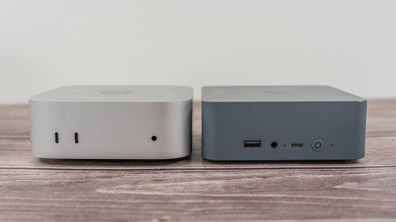 Apple Mac Mini and a Mini PC side-by-side on a table.