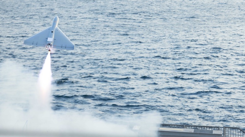 Low-cost Unmanned Combat Attack System (LUCAS) drone launching from the deck of the USS Santa Barbara