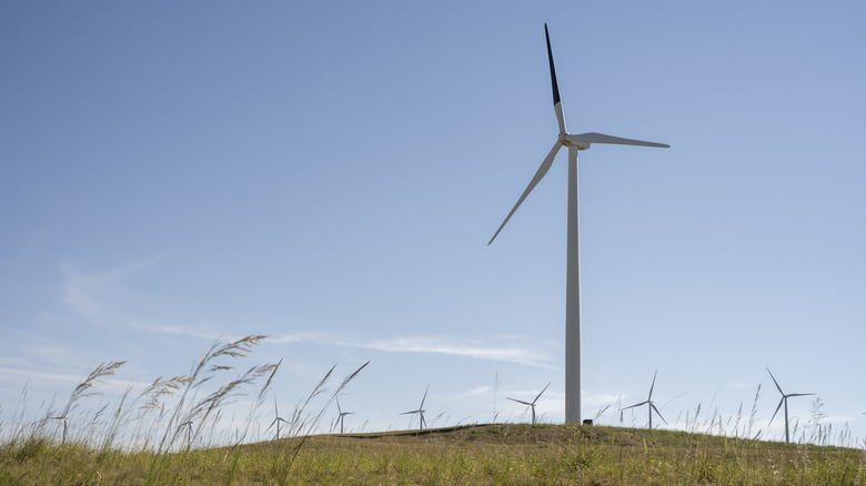 A wind turbine with one blade painted black at a wind farm near Glenrock, Wyoming