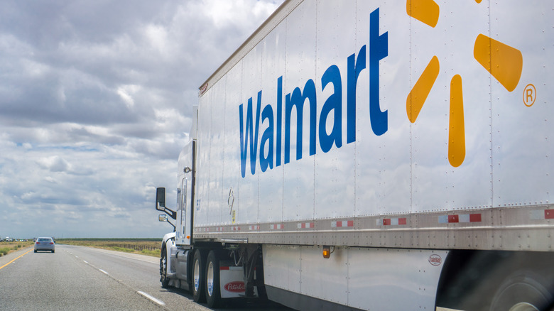 Walmart truck on a highway.